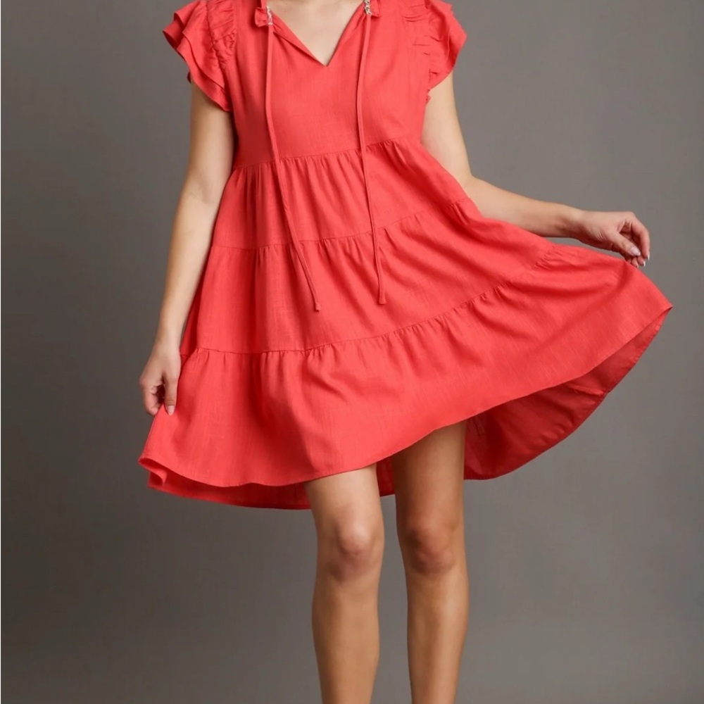 I’m her size large Coral color in excellent condition